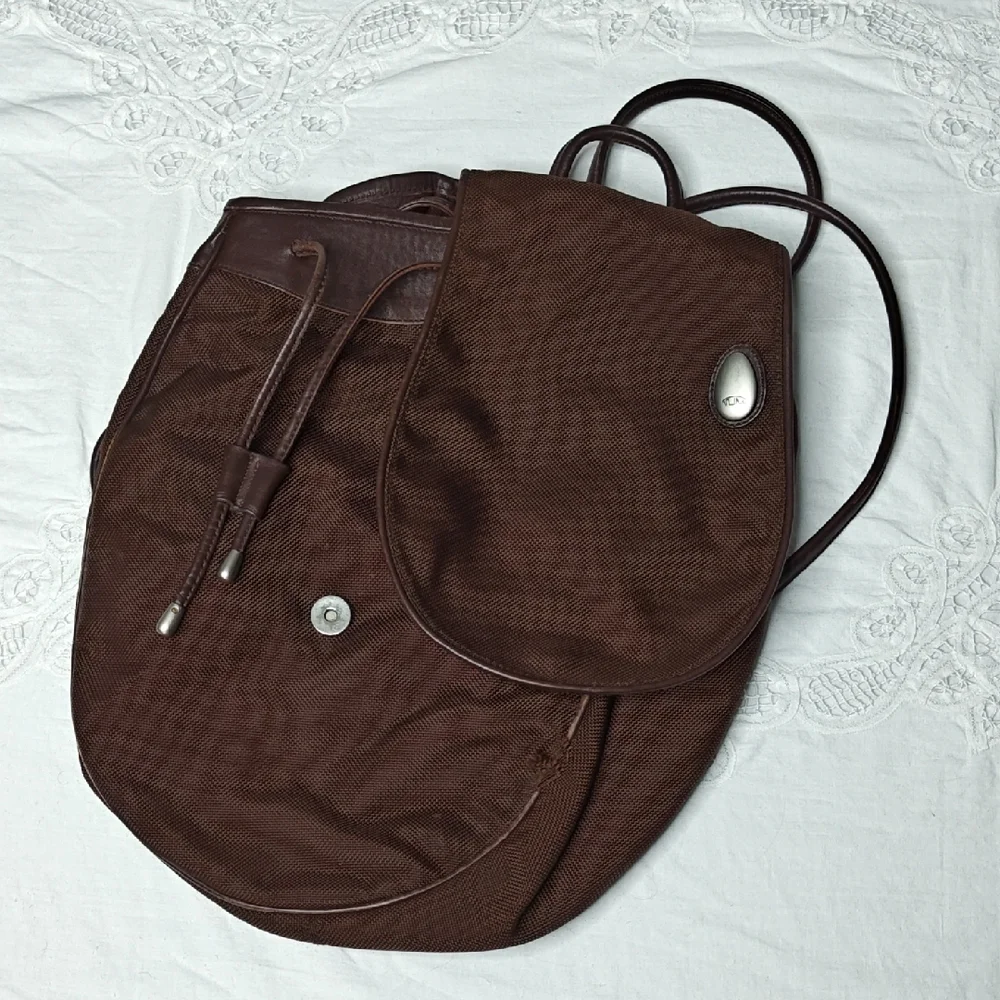Tumi Italian Leather Drawstring Backpack Sling